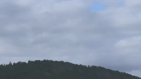 Clouds float over the Black Forest  in the twilight. Time lapse Video stock 53806173