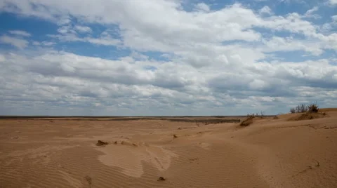 Clouds float over the desert Video stock 54551450