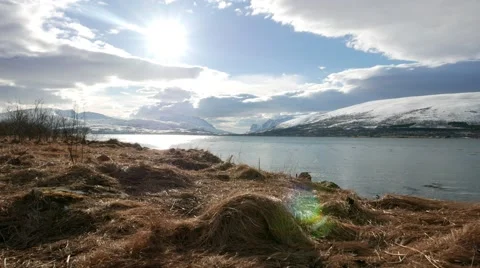 Clouds float over the fjord and mountains. Stock Footage 62679712