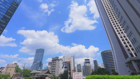 Clouds float over the Kabukicho seen from Nishi-Shinjuku in Tokyo Video stock 292182859
