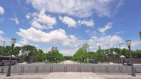 Clouds float over the Kokyo Gaien National Garden at Chiyoda in Tokyo Stock Footage 280632332