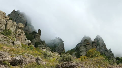 Clouds float over the mountains. Stock-Footage 97104207