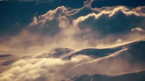 Clouds float over the mountains Stock Footage 131376363