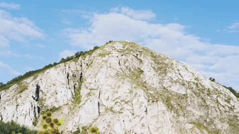 Clouds float over the rock (Time Lapse) 库存影片 94384207