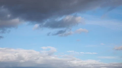 Clouds float through a rapidly dramatically darkening sky. Stock Footage 129071416