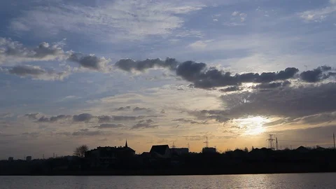 Clouds float through the sky at time lapse, spring sky with clouds Video stock 128451578
