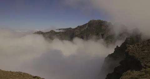 Clouds float to the tops of the mountains, Madeira, 4K Stock Footage 246381446