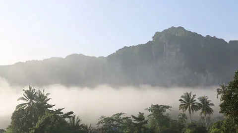 Clouds float of tropical mountains Stock Footage 42110313