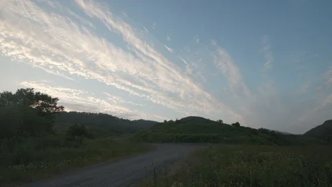 Clouds floating over the hill 스톡 동영상 118314377