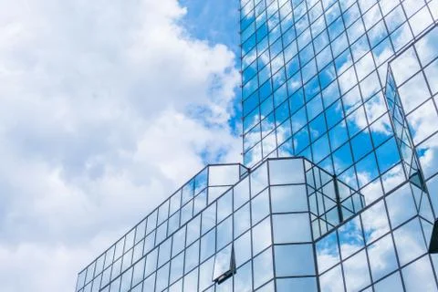The clouds floating over the skyscrapers Stock Photos