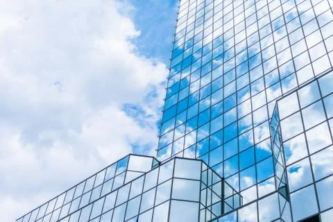 The clouds floating over the skyscrapers Stock Photos