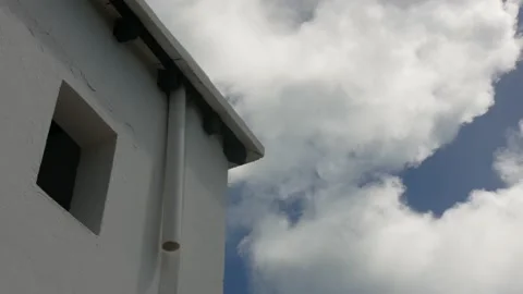 Clouds Floating Past a Ferry Dock Stock Footage 136322318