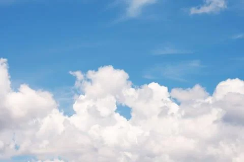 Clouds floating together in blue sky Stock Photos