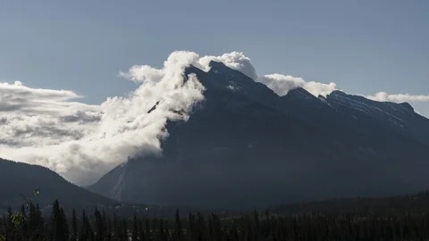 Clouds flow over mount Rundle near Banff, Alberta 8K timelapse Stock Footage 124576322