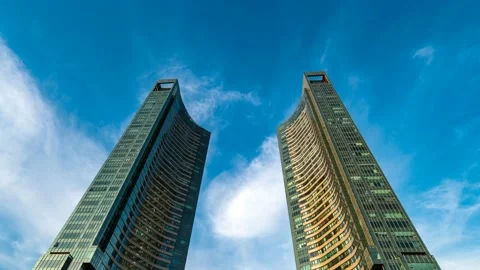 Clouds flow through high apartment complexes. Stock Footage 145889549