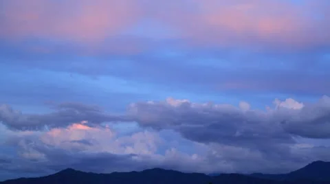 Clouds flowing after sunset in the mountains. Timelapse. Stock Footage 16270404