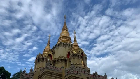 Clouds flowing behind Buddhist temple Stock Footage 203185029