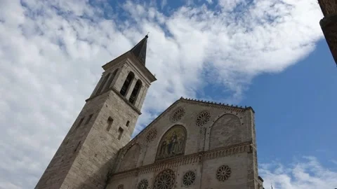 Clouds flowing over the cathedral of Spoleto. Time lapse shooting Stock Footage 206348610