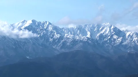 Clouds Flowing Over the Northern Alps Stock-Footage 332378374