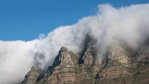 Clouds flowing over Table Mountain, Cape Town, South Africa Stock Footage 102629639