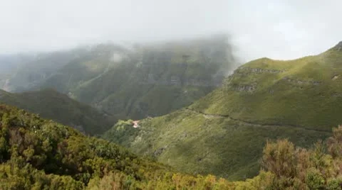 Clouds flowing over a valley. Madeira. Stock Footage 10569056