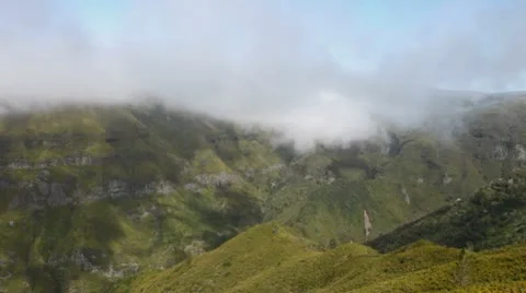 Clouds flowing over a valley. Madeira. Stock Footage 10574079