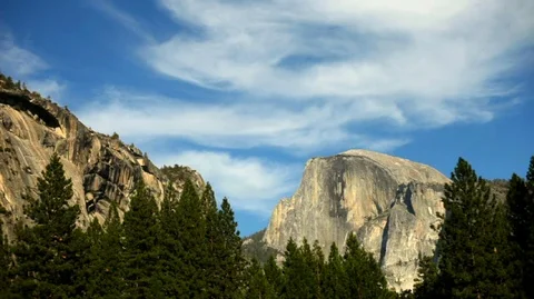 Clouds flowing through the sky over Yosemite National Park, California, USA. Stock Footage 88342936