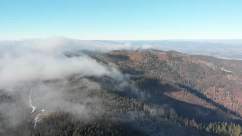 Clouds flows over mountain top. Flying over Radziejowa Range in Beskidy Stock Footage 145301144