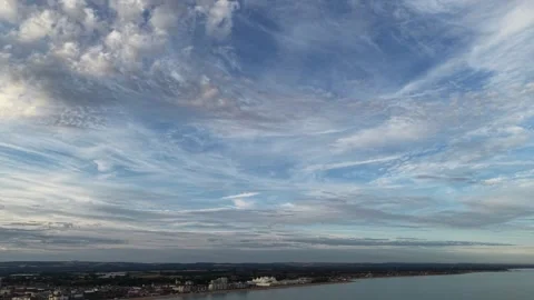 Clouds Fly Across Blue And Silver Sky With Soft Evening Light Stock Footage 341865420