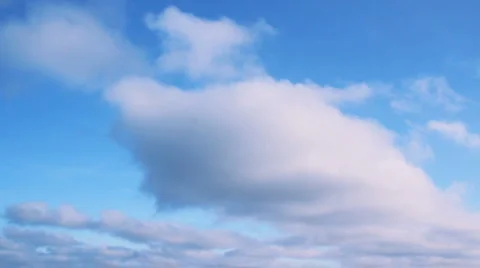 Clouds fly across the blue sky Stock Footage 923485