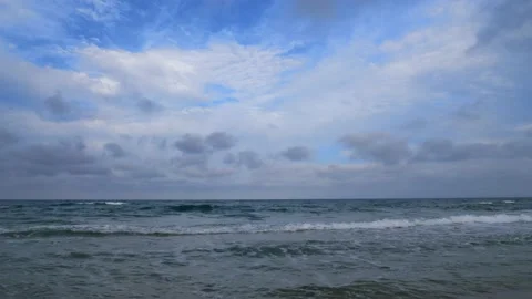 The clouds fly fast with timelapse in the evening on the Spanish beach. Stock Footage 138208728