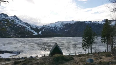 The clouds fly over the frozen lake. Stock Footage 62930962