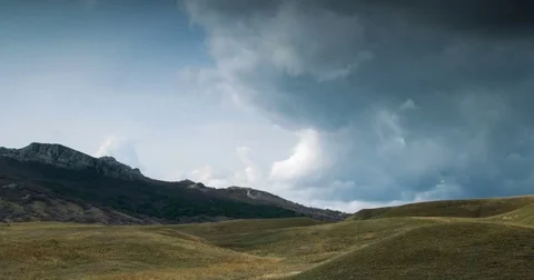 Clouds fly over the hills Stock-Footage 79385154