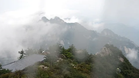 Clouds fly over the mountains Stock Footage 76945517
