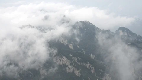 Clouds fly over the mountains Stock Footage 76945522