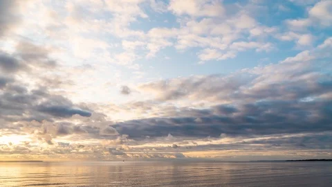 Clouds fly over the surface of the Gulf of Finland. Evening timelapse. Stock Footage 117441172