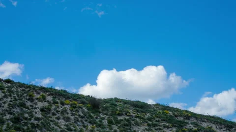 Clouds fly over the top of the hill Stock Footage 50367525