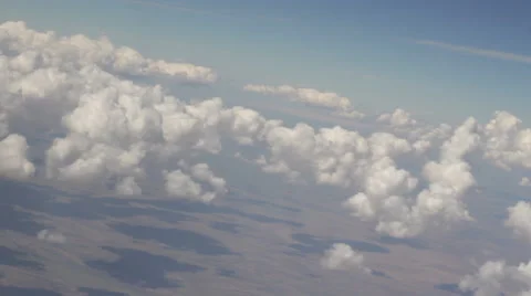 Clouds flyby seen from an airplane Stock Footage 61436670