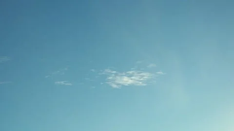 Clouds flying across the sky time lapse Stock Footage 299568532