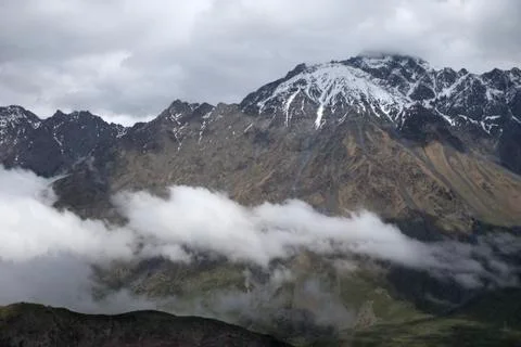 Clouds Flying Between Mountains Stock Photos