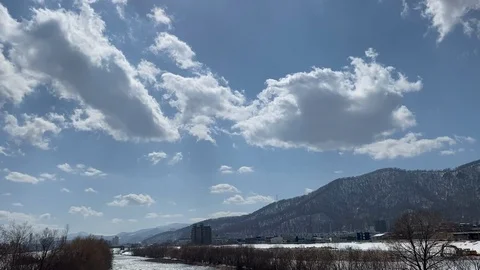 Clouds flying over head in Hokkaido Stock Footage 127613727