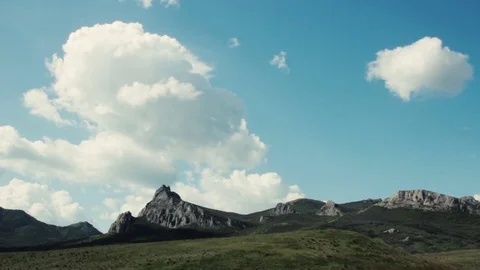 Clouds flying over mountains Stock Footage 72772751
