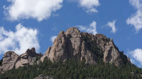 Clouds Flying over Rocky Mountains Stock Footage