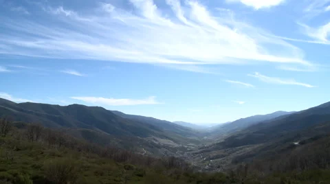 Clouds flying over valley of fruit plantations, time lapse Stock Footage 49652862