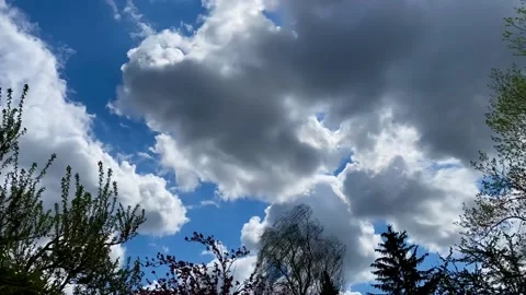 Clouds flying by, time lapse 動画素材 153589559