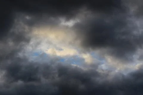 Clouds form in a dark cloud. Rays of sunlight Stock-Fotos