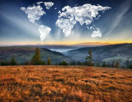 Clouds in the form of a map of the world over the mountains Stock Photos