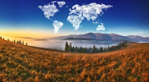 Clouds in the form of a map of the world over the mountains Stock Photos