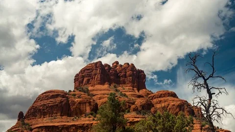 Clouds form over Bell Rock in this beautiful timelapse from Sedona, AZ. Video stock 80826233
