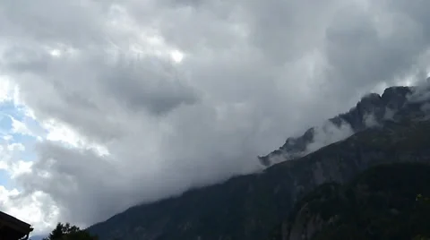 Clouds Form Over Mountain Scene Stock Footage
